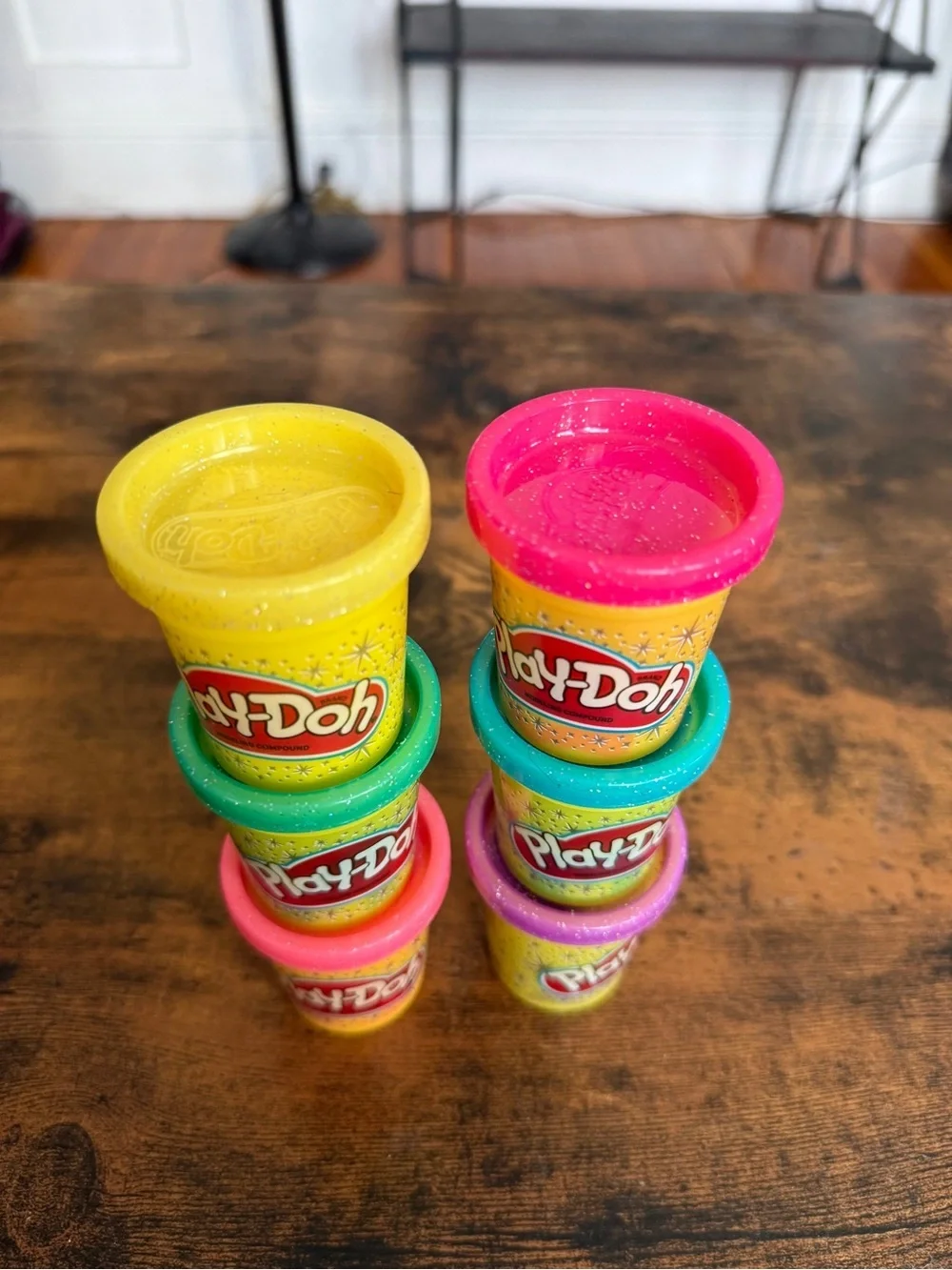 Play-Doh small Yellow with Pink, Teal, Purple, and Green Lids comes with all